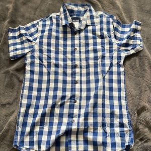 button up T shirt. flannel